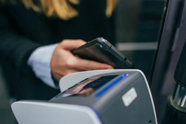 Mobile payment using phone at a terminal